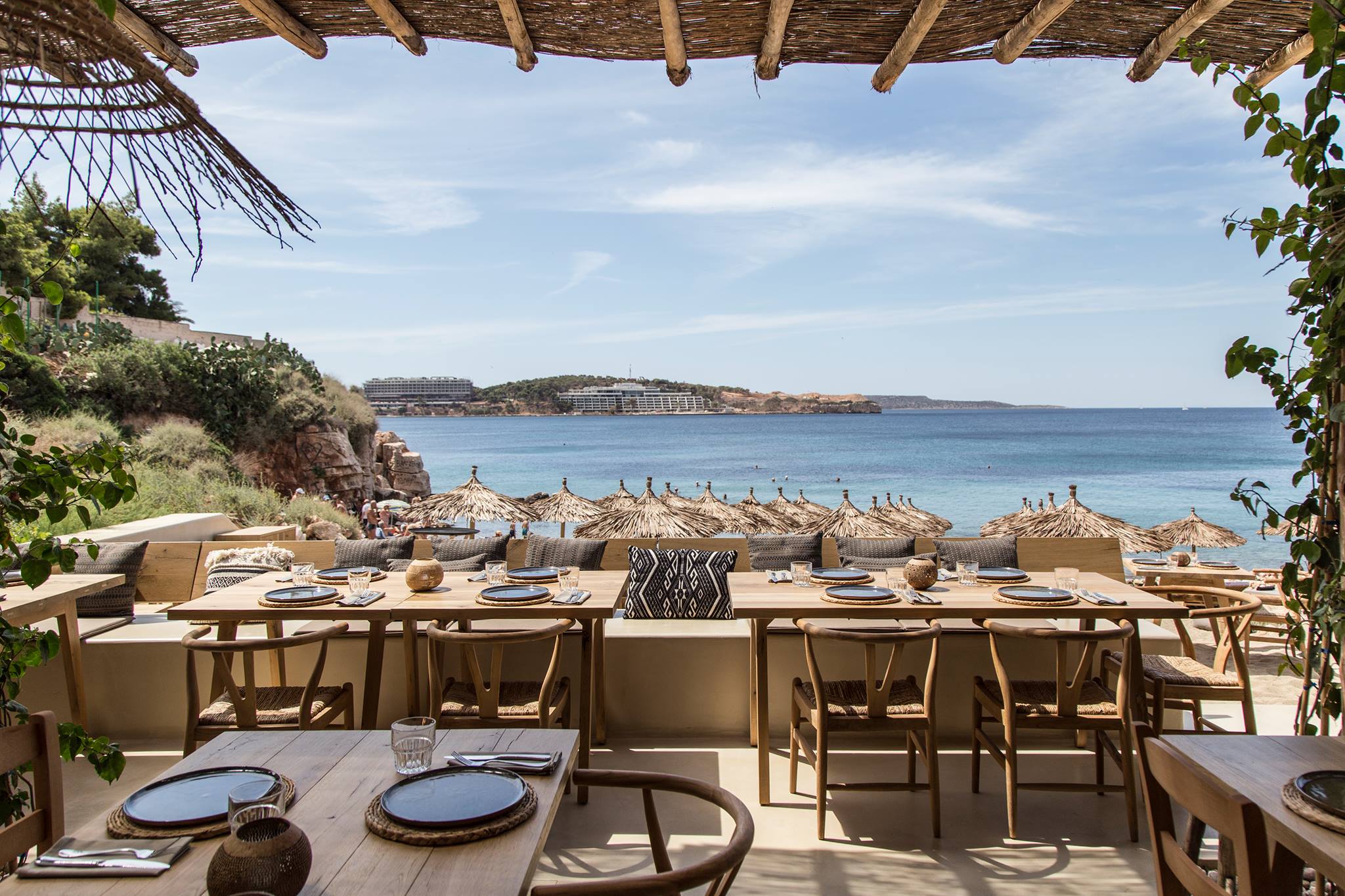 Seaside dining terrace overlooking an Athens Riviera beach